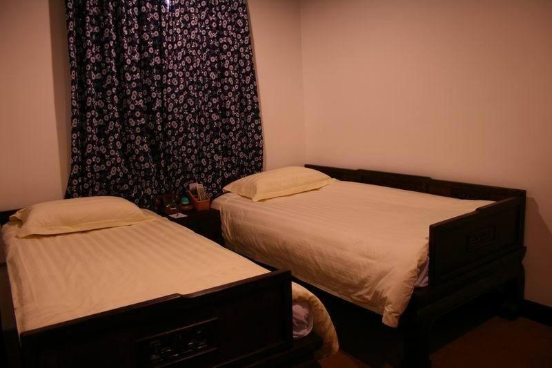 XI Di Travel Lodge Yi (Anhui) Rom bilde