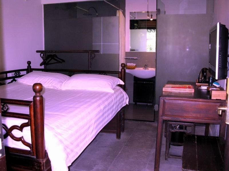 XI Di Travel Lodge Yi (Anhui) Rom bilde